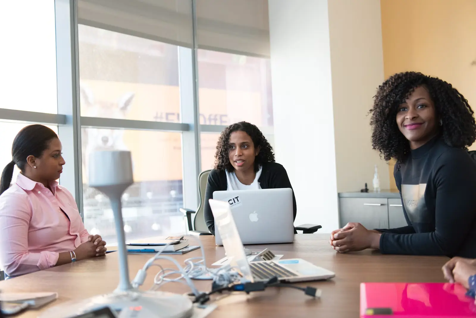 Three women in a working session