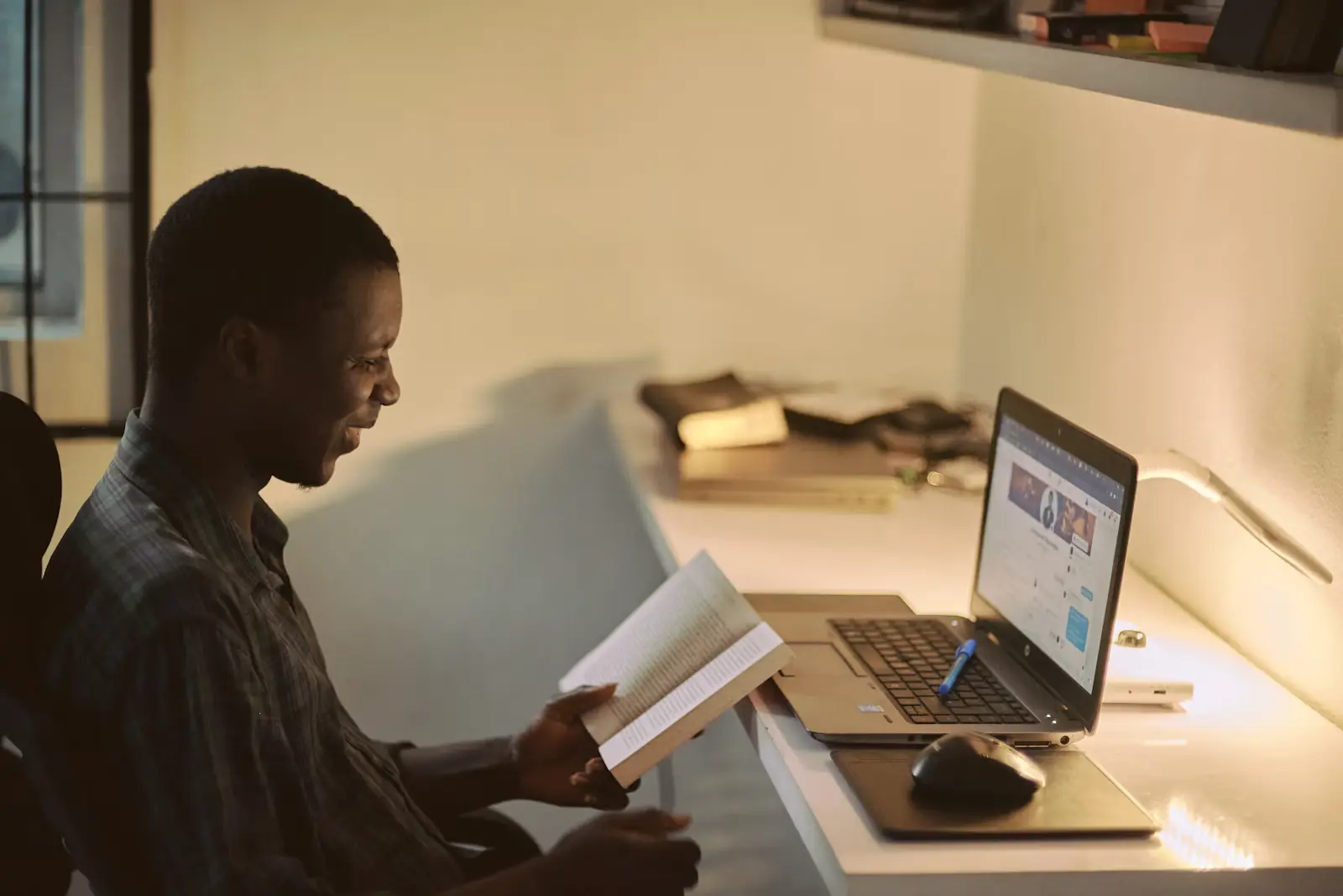 A company secretary working at a laptop