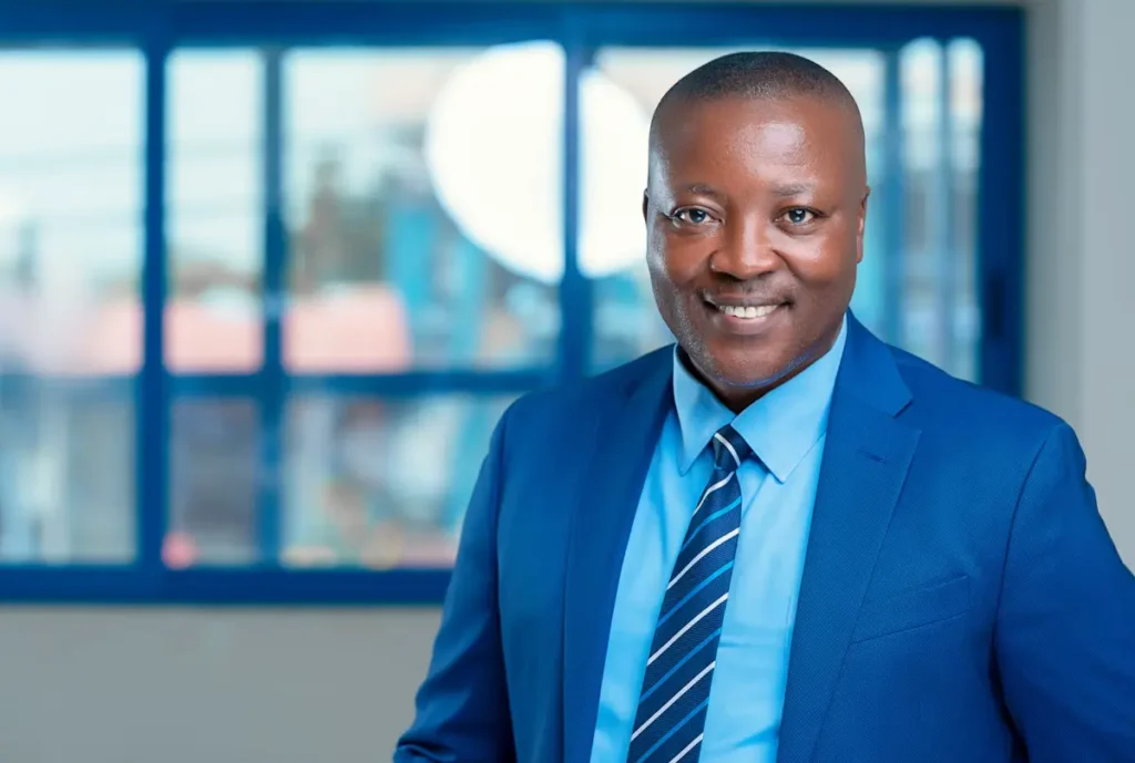A smiling professional in a suit