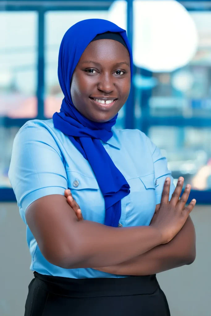 A professional woman in a blue shirt