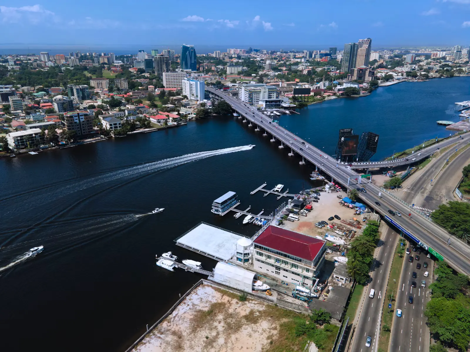 Boats on the Lagos lagoon beside the Lekki-Ikoyi Link Bridge
